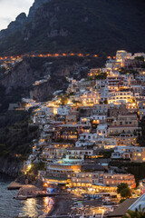 Night view over Positano town and beach in Amalfi coast in Italy.