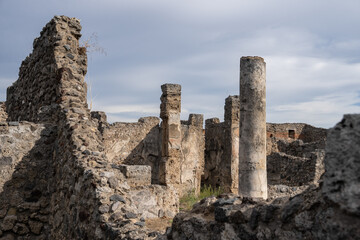 View of ancient Roman city ruins street of Pompei, destroyed from eruption of Mount Vesuvius in 1st century.