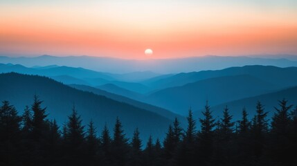 Obraz premium Serene Sunset Over Blue Mountain Ranges