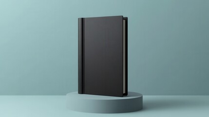 Minimalist Black Book Mockup on a Light Blue Pedestal with Plain Background.