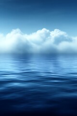 Fototapeta premium Serene ocean scene with clouds reflecting on calm water.