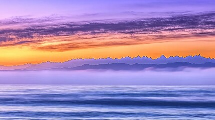 Fototapeta premium Purple sky over calm ocean with distant mountain range during sunset in a peaceful scene