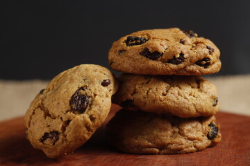 Chocolate chocochips on a wooden tray