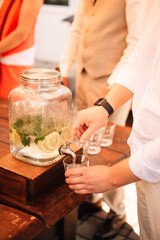 Refreshing ice drink with lemon, lime and mint. Infusion of lemonade with citrus