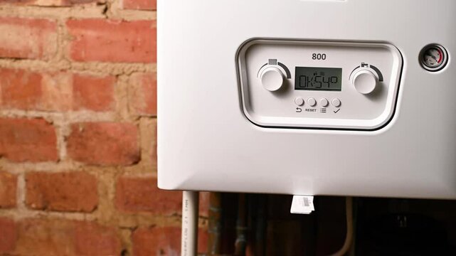 Increasing price for gas. Control panel of central heating at combi boiler. 