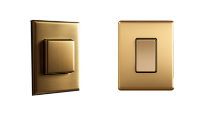 Two Gold colored light switches, one at an angle and the other directly facing forward against a solid black background