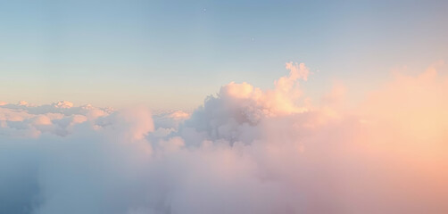 Fluffy clouds stretch across the sky, illuminated by warm sunset colors. The gentle blend of pink, orange, and blue creates a tranquil and beautiful scenery, inviting calm reflections