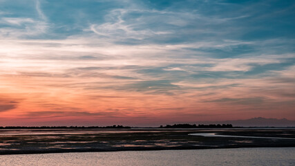Spring sunset in the lagoon of Grado