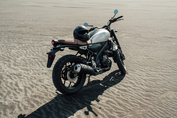 Motorbike in sand sea or desert. Adventure and travel for extreme sports challenge. Off road