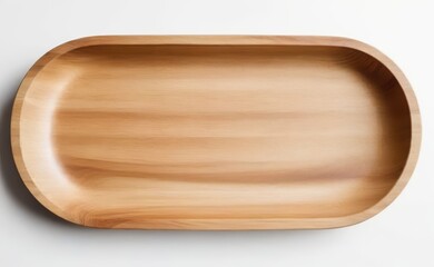 A smooth, organic-shaped wooden bowl rests on a clean white background.