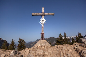 Summit cross at Heuberg mountain tour in springtime