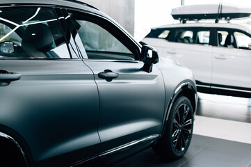 matte black car in the showroom