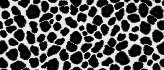 Black-and-white cow print pattern creating a striking abstract design with organic irregular shapes