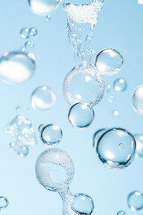 A high-speed capture of bubbles forming and popping during dishwashing, emphasizing the playful aspect of cleaning,
