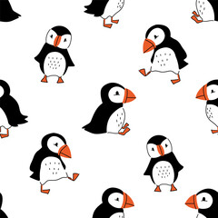 A seamless pattern with cute puffin birds. Nordic seagull baby print.