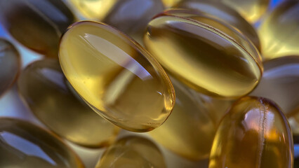 A close up of yellow pills omega 3