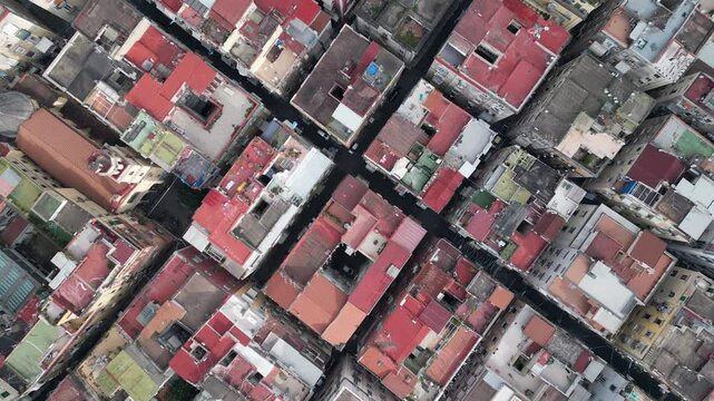 Overhead aerial view and grid structure of Spanish Quarter neighborhood in Napoli, urban landscapes and city planning in Italy

