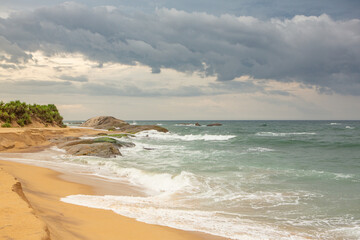 The beautiful beach on the coast of the Indian Ocean in Sri Lanka.
