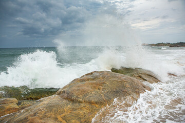 The beautiful beach on the coast of the Indian Ocean in Sri Lanka.