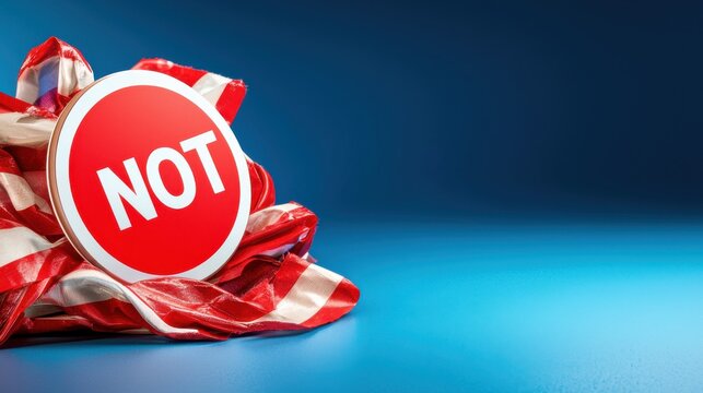 Red and white NOT sign resting on vibrant striped fabric against a dynamic blue background, conveying a sense of caution or prohibition.