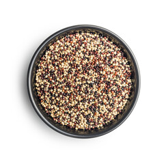 Mixed uncooked quinoa seeds in bowl isolated on white background.