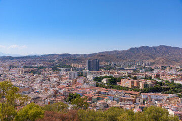 Obraz premium Malaga, Spain - August 06, 2024: Views of the city Malaga from the Gibralfaro Castle in the city of Malaga, Andalusia. Spain