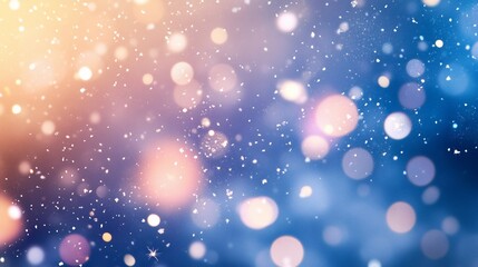Obraz premium Abstract winter bokeh background with warm and cool colors, glowing lights and falling snow.