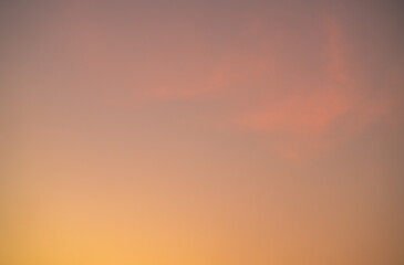 Vibrant orange sunset sky creating a serene and tranquil atmosphere, ideal for climate and environmental concepts or as an emotional and psychological design background, evoking warmth and creativity.