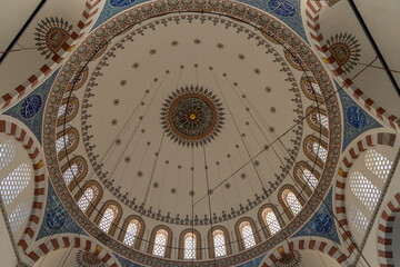 interior of historical Rustem Pasha Mosque at sunset. Ottoman architecture by Mimar Sinan shines amid peaceful rays, capturing a spiritual ambiance. Ramadan, islamic, muslim.