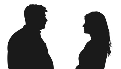 Silhouetted man and woman standing face to face