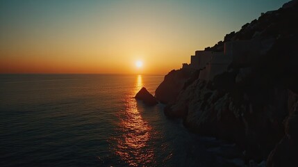 Sunset over coastal fortress, tranquil sea, golden hour, travel, landscape photography