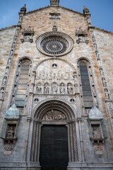 Tourist destination small medieval village of Como with hilly narrow streets and luxurious villas, holiday destination on Lake Como, Italy in spring