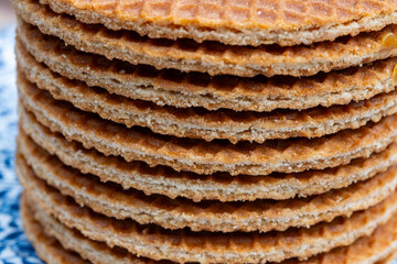 Traditional Dutch sweet dessert, Butter caramel syrup waffles, fresh baked