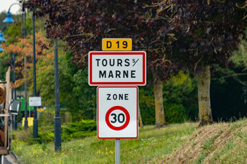 Road signes and places of destinations, Gran Cru villages, black road sign english translation: tourists route. Autumn in Champagne wine making region near Epernay, France
