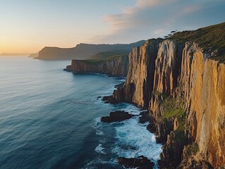 Coastal cliffs sunrise aerial view, ocean waves crashing, travel, nature