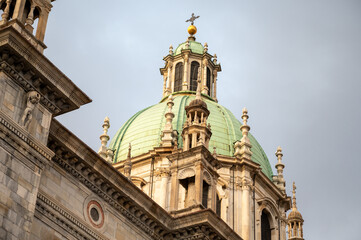 Tourist destination small medieval village of Como with hilly narrow streets and luxurious villas, holiday destination on Lake Como, Italy in spring