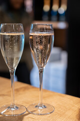 Tasting sparkling white wine, traditional champagne method making of cremant in caves on Moselle river valley in Luxembourg, wine tour and visiting caves