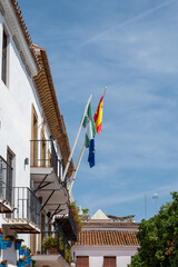 Pearl of Costa del Sol, Marbella touristic town, view of old town with white houses, decoration, narrow strets and flowers, Andalusia, Spain