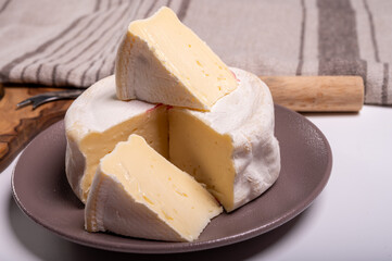 Cheese collection, French reblochon de savoie gratin cow milk cheese close up