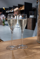 Tasting sparkling white wine, traditional champagne method making of cremant in caves on Moselle river valley in Luxembourg, wine tour and visiting caves