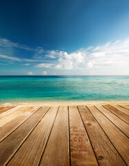 Fototapeta premium Tranquil Beach Scene Wooden Deck, Blue Ocean, Sandy Shore, Generated image