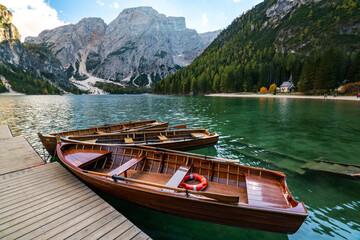 Serene Lago di Braies with Boats and Majestic Mountains