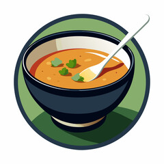 Bowl of soup with a spoon on a green background