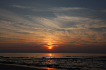 Obraz premium Summer closeup sunset sea sky landscape. Colorful ocean beach sunrise. Beautiful beach reflections calm waves, soft sandy beach. Perfect tropical coast horizon scenic coast view. Wallpaper