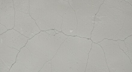 A smooth concrete texture in soft gray tones, accented by fine microcracks and subtle surface variations.