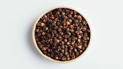 Natural Brown Seeds in a Rustic Bowl on Neutral Background