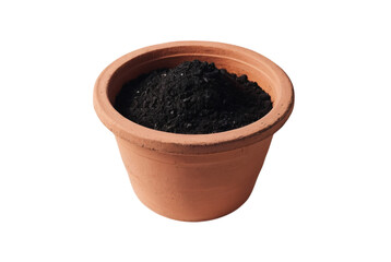A clay pot filled with black soil on white background