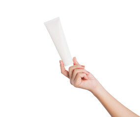 Female hand holding blank cosmetic bottle isolated on white background