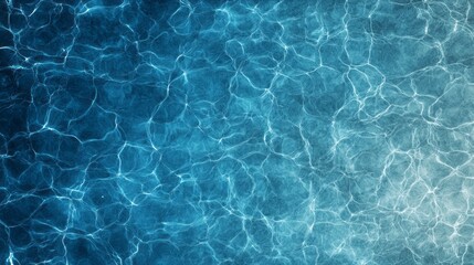 Top view of a beautiful, clear turquoise water with sun reflection. Sunlight filters through the ripples on the surface. Abstract summer banner background Water waves in sunlight with copy space 