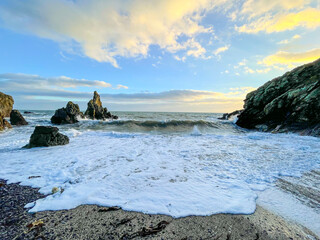 Landscape of Howth beach Walk overlooking the Ireland coastline and North Sea during sunset, Howth, Cliffs, Dublin, Ireland